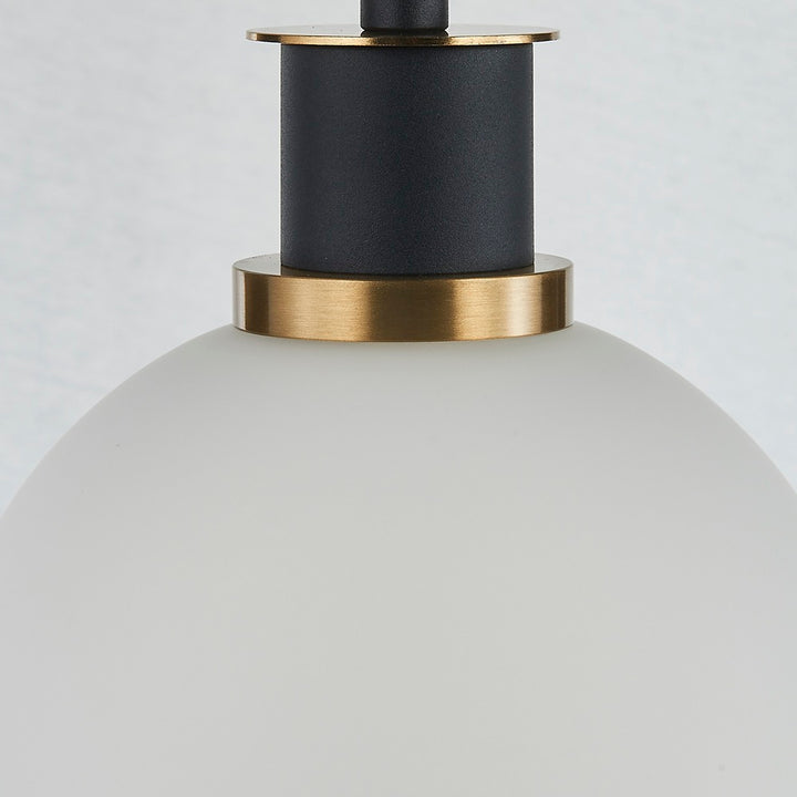 Gem Collection 1-Light Pendant with White Glass Black and Brushed Brass