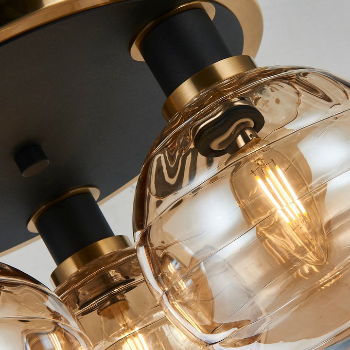 Gem Collection 3-Light Semi-Flush Mount with Amber Glass Black and Brushed Brass