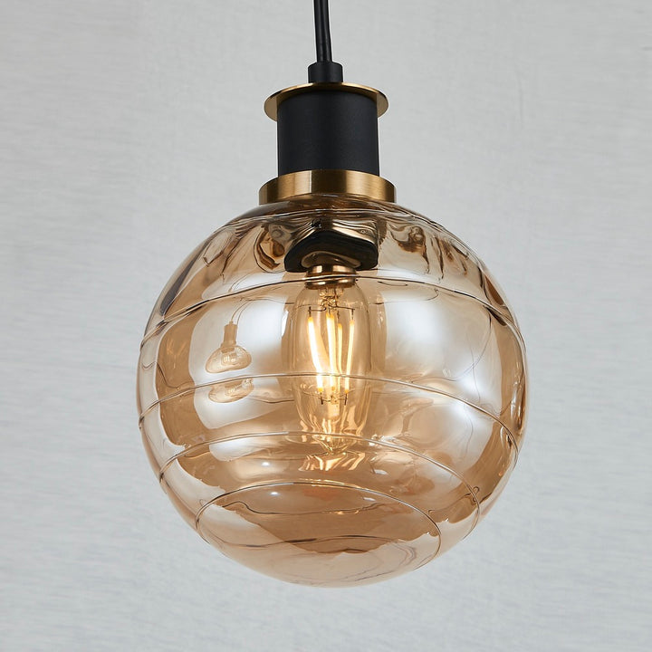Gem Collection 4-Light Island/Pool Table with Amber Glass Black and Brushed Brass