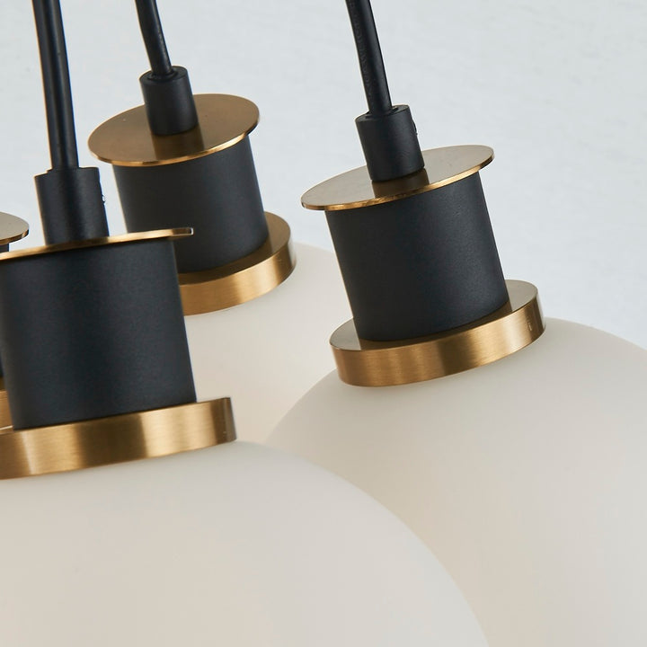 Gem Collection 7-Light Pendant with White Glass Black and Brushed Brass