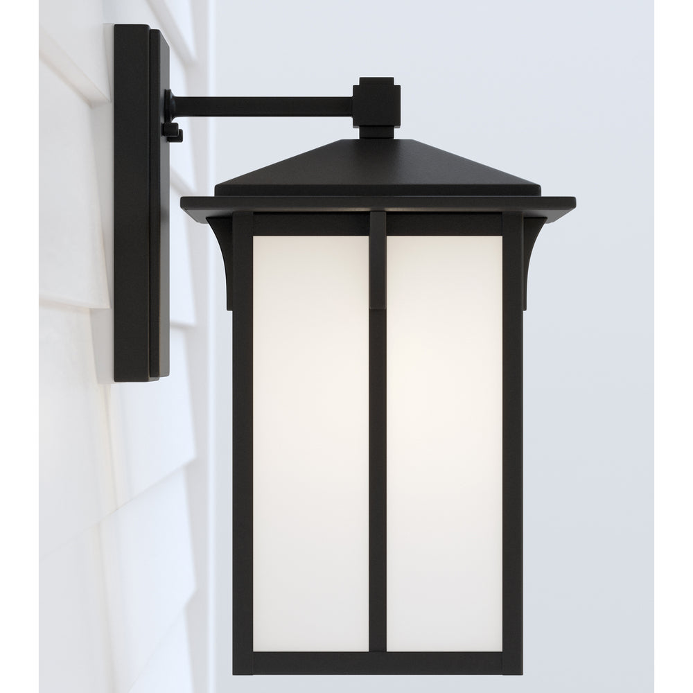 Tomek modern 1-light outdoor exterior medium wall lantern sconce in black finish with etched white g