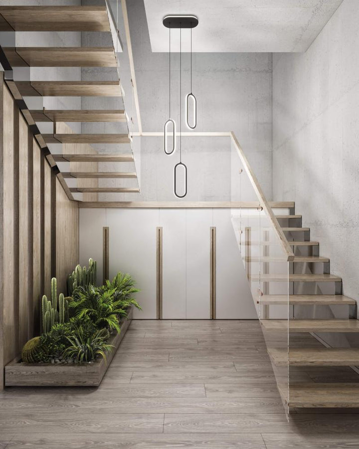 3 vertical oblong pendants with lit cluster 5CCT